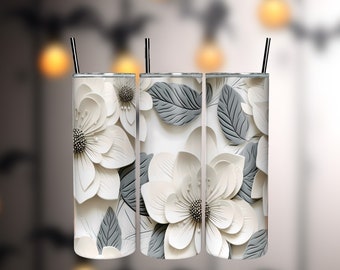 May include: Three stainless steel tumblers with a white and gray floral design. The flowers are 3D and have a paper-like texture.