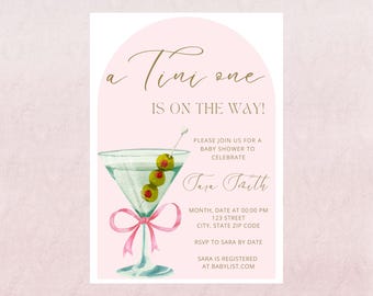 May include: A baby shower invitation with a pink background and a watercolor illustration of a martini glass with olives. The text reads "a Tini one IS ON THE WAY!" and includes details for the event, such as the date, time, and location.