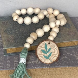 Farmhouse Wood Bead Botanical Garland with Green Tassels