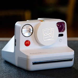 Polaroid Now Lens Cap with Polaroid Print Icon by FotoFoundry