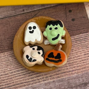Plate of dollhouse miniature Halloween cookies