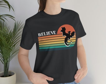 Believe Dragon Sunset Unisex T-Shirt - Retro Shirt for D&D, Roleplay, and Nerd Culture Fans