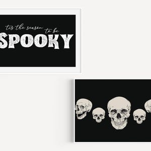 May include: Two printable Halloween signs. The first sign has a black background with white text that reads "tis the season to be SPOOKY". The second sign has a black background with five white skulls.