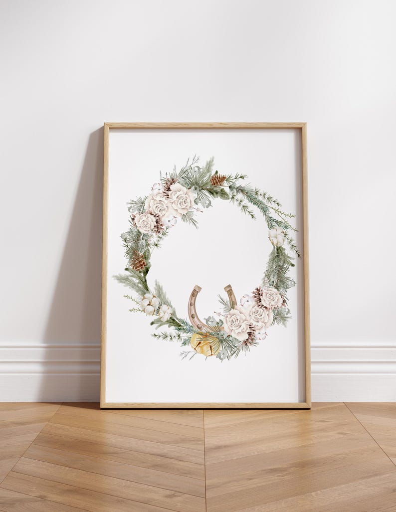 May include: A framed watercolor painting of a winter wreath with white flowers, pine branches, cotton bolls, and a horseshoe.