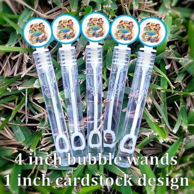 May include: Five clear plastic bubble wands with white internal wands and circular toppers. Each topper features a colorful Toy Story character graphic. The wands are arranged vertically, each measuring 4 inches in length with a 1 inch cardstock design.