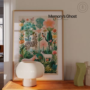 May include: A framed print featuring a colourful illustration of a zebra, goats, and birds in a jungle setting. The print is titled "Memory's Ghost" with the text "Design Studio - Chicago, IL" below the title.