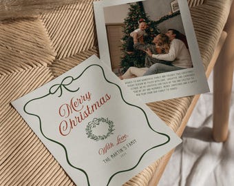 May include: A green and white Christmas card with a wreath and the text "Merry Christmas" in red. The card also includes the text "With Love, The Martin's Family 2021".