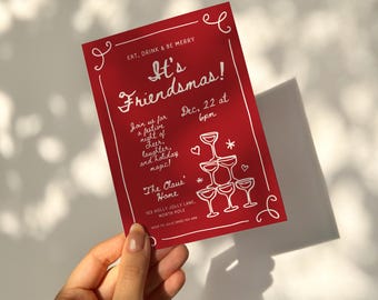 Puede incluir: Tarjeta de invitación roja con texto blanco que dice "Eat, Drink & Be Merry It's Friendsmas! Join us for a festive night of cheer, laughter, and holiday magic! The Claus' Home 123 Holly Jolly Lane, North Pole" con una ilustración blanca de una torre de champán.