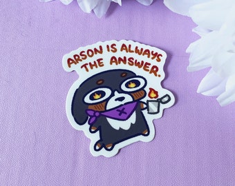 May include: A cartoon sticker of a dog wearing a purple bandana and holding a lighter. The dog has a mischievous expression and the text "Arson is always the answer." is above the dog.