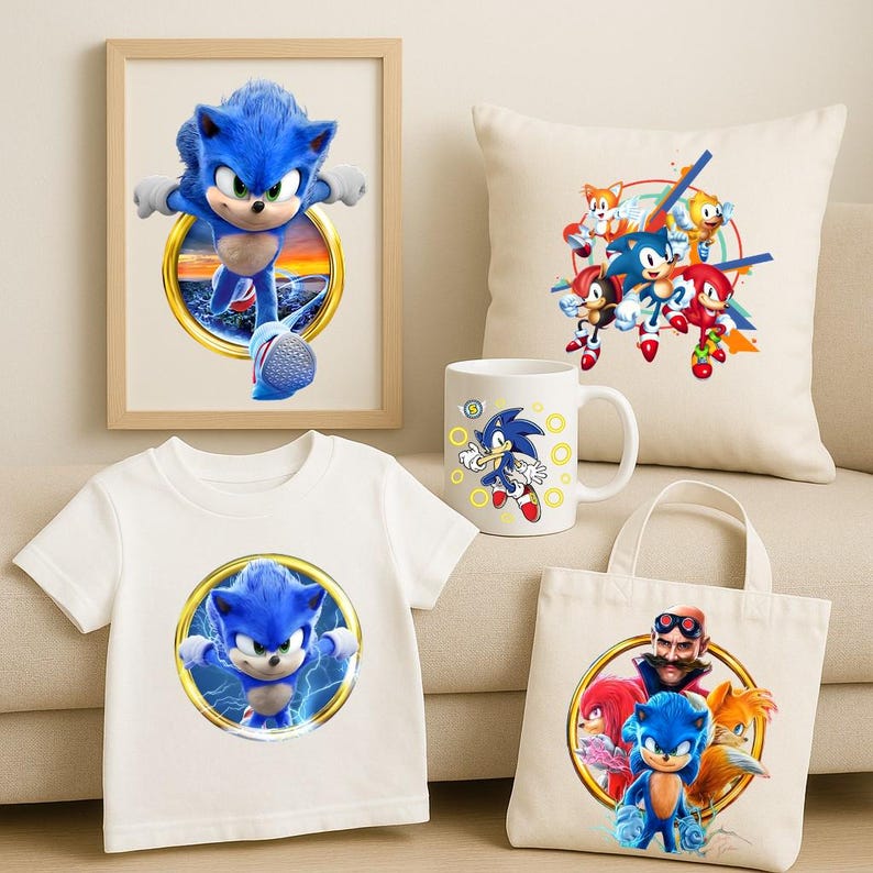 May include: A collection of Sonic the Hedgehog themed merchandise, including a framed print, a white t-shirt, a coffee mug, a pillow, and a tote bag. The items feature images of the blue hedgehog and other characters from the franchise.