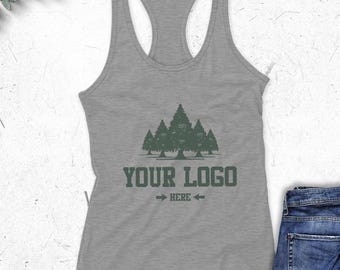 May include: A heather gray racerback tank top with a forest graphic and the text "YOUR LOGO HERE" in green. The tank top is made of a soft, comfortable material.