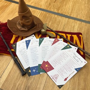 May include: Four printable "Wizarding World" checklists with a red, blue, green and yellow colour scheme. The checklists include tasks like "Take a magical journey", "Visit a wizarding castle", and "Drink a Butterbeer".