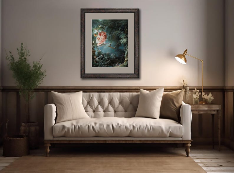 May include: A framed painting of a woman in a pink dress swinging on a rope in a lush green forest. The painting is set against a white background.