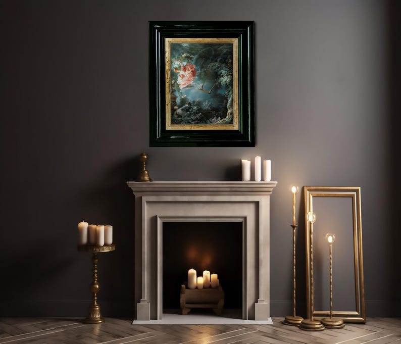 May include: A framed painting of a woman in a pink dress flying through the air, surrounded by clouds and trees. The painting is hanging on a dark gray wall above a fireplace with candles.