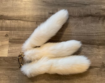 Large ranch white fox tails.    Costume, taxidermy, key chain, art craft