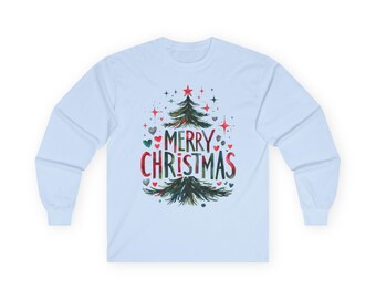 May include: A pale blue long-sleeved shirt with a Christmas tree design and the words "MERRY CHRISTMAS" in red and green. The design includes red stars and green hearts.