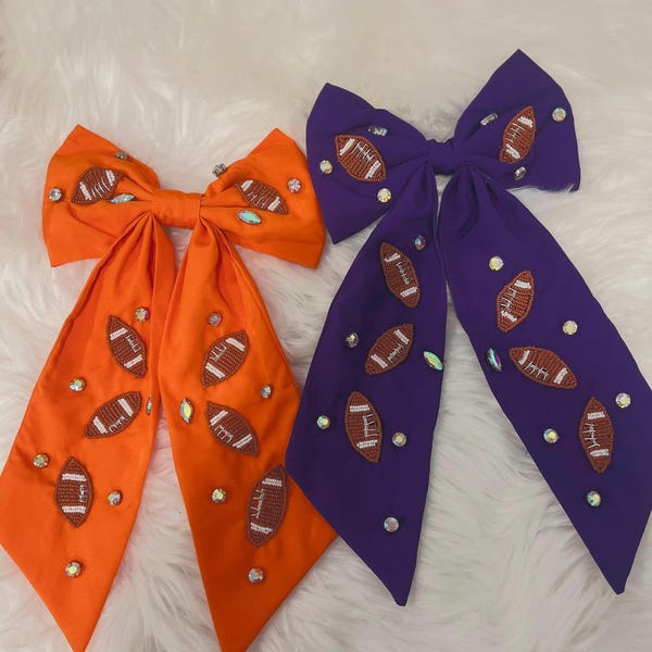 Football hair bows/ large hair bow/ football accessories/ football hair bow/ Sports accessories/purple football bow/ sports bow/ LSU