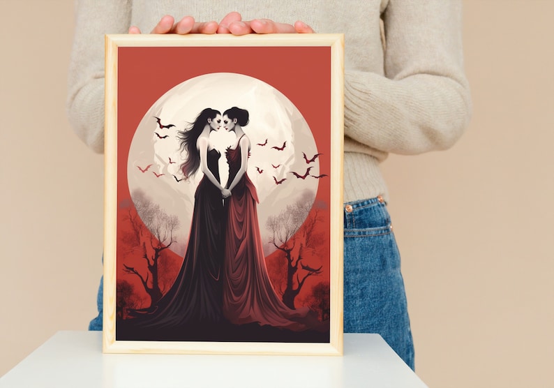 May include: Two women in long dresses stand facing each other in front of a large, full moon. They are surrounded by bats flying in the night sky. The background is a red and gray landscape.