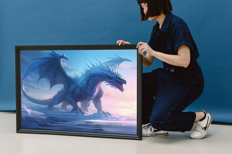 May include: A framed canvas print featuring a blue dragon with wings spread wide, set against a cloudy sky with a pink and orange sunset. The dragon is in the foreground, with its head turned to the right, and its tail extending to the left. The dragon's scales are detailed and textured, and its eyes are bright and alert.