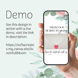 May include: A smartphone displays a design with floral accents and the text "From Our Hearts To Yours." The design includes a white envelope sealed with a pink heart. The phone is held in a hand, with additional text on the left side.