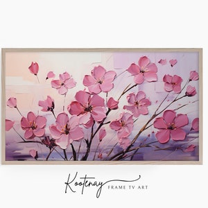 Op de afbeelding: Een ingelijst schilderij van roze kersenbloesems op een witte achtergrond. Het schilderij is gesigneerd met "Kootenay FRAME TV ART".