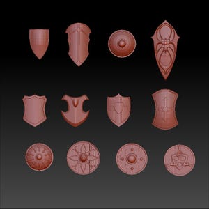 Puede incluir: Una colección de 11 diseños de escudos diferentes, todos de color marrón rojizo. Los escudos son de varias formas y tamaños, algunos con detalles intrincados.