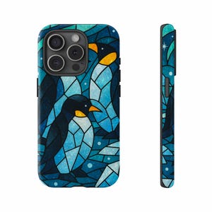 May include: A phone case featuring a stained-glass design of penguins in shades of blue, black, and yellow. The case has a glossy finish and a protective bumper. The design wraps around the sides and back of the phone.