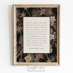 May include: A framed print with a floral pattern in brown and black. The print displays the text of 1 Corinthians 13:4-8, starting with "Love is patient and kind." The frame is gold-coloured.
