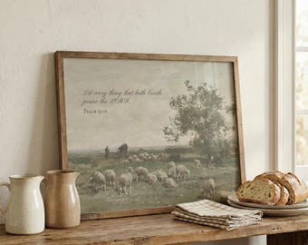 Könnte beinhalten: Ein gerahmter Kunstdruck mit einer Schafherde auf einer Wiese unter einem bewölkten Himmel. Der Holzrahmen umschließt das Kunstwerk, das den Text "Let every thing that hath breath praise the LORD. Psalm 150:6." enthält.