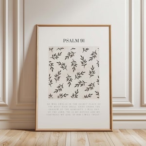 Könnte beinhalten: Ein druckbares Wandbild mit Psalm 91, einem Bibelvers, mit einem Hintergrund aus schwarzen Blättern auf beigefarbenem Untergrund. Der Text lautet: "Wer unter dem Schutz des Höchsten wohnt, findet Ruhe im Schatten des Allmächtigen. Ich sage zu dem Herrn: "Du bist meine Zuflucht und meine Festung: Mein Gott, auf dich vertraue ich."