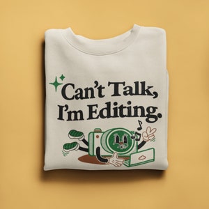 Can't Talk, I'm Editing - Retro Mascot Cream Photography Unisex Crewneck