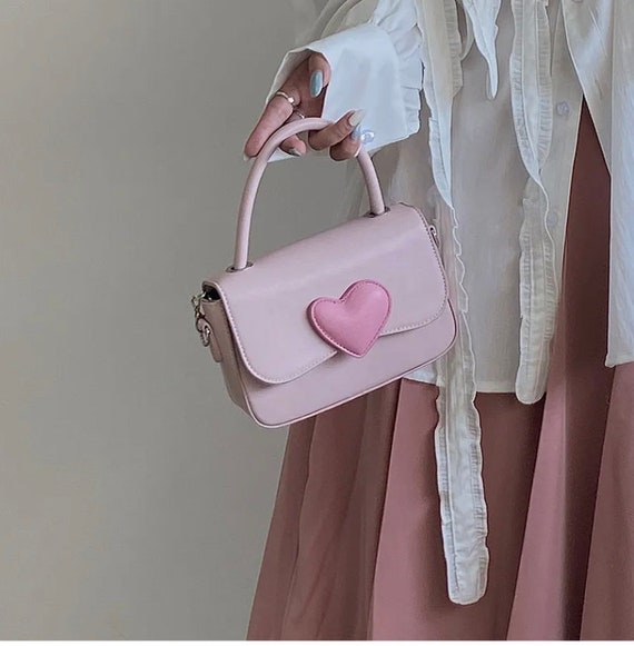 pink heart shaped bag