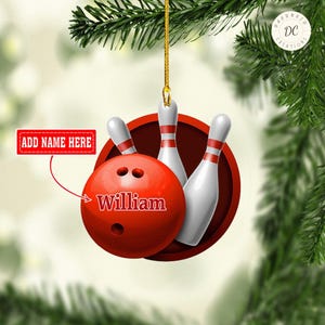 May include: Red and white bowling ball Christmas ornament with three white bowling pins. The ball has the name "William" written on it.