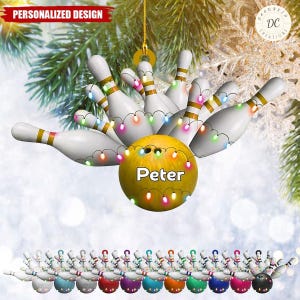 May include: A yellow bowling ball Christmas ornament with a personalized name "Peter" and ten white bowling pins with gold stripes around them. The ornament is decorated with colorful lights.