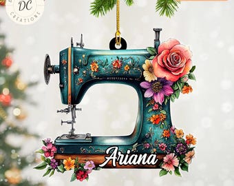 May include: Teal sewing machine ornament with floral accents and the name "Ariana". The ornament features a large pink rose and various colorful flowers. The text "Customize Your Design" is visible.
