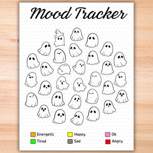 May include: A printable mood tracker featuring a circle of ghosts with different facial expressions. The ghosts are surrounded by a dotted grid. The bottom of the page includes a legend with four colored squares: orange for energetic, green for tired, yellow for happy, gray for sad, pink for ok, and red for angry.