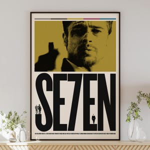 Könnte beinhalten: Ein Vintage-Filmplakat für den Film "SEVEN" mit einer Nahaufnahme von Morgan Freemans Gesicht in Schwarzweiß. Der Titel "SEVEN" ist in großen, fetten, schwarzen Buchstaben auf cremefarbenem Hintergrund.