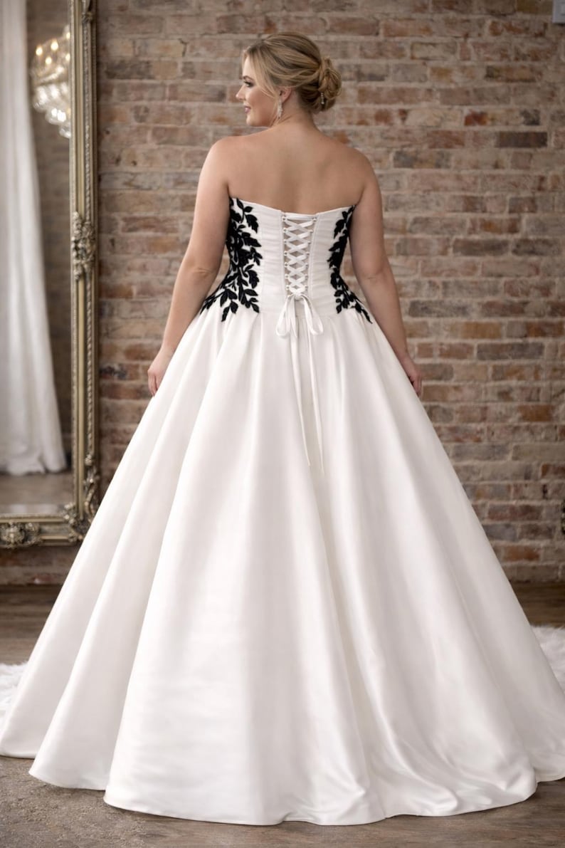 Strapless Satin Ball Gown With Black Lace & Asymmetrical Skirt Detail ...