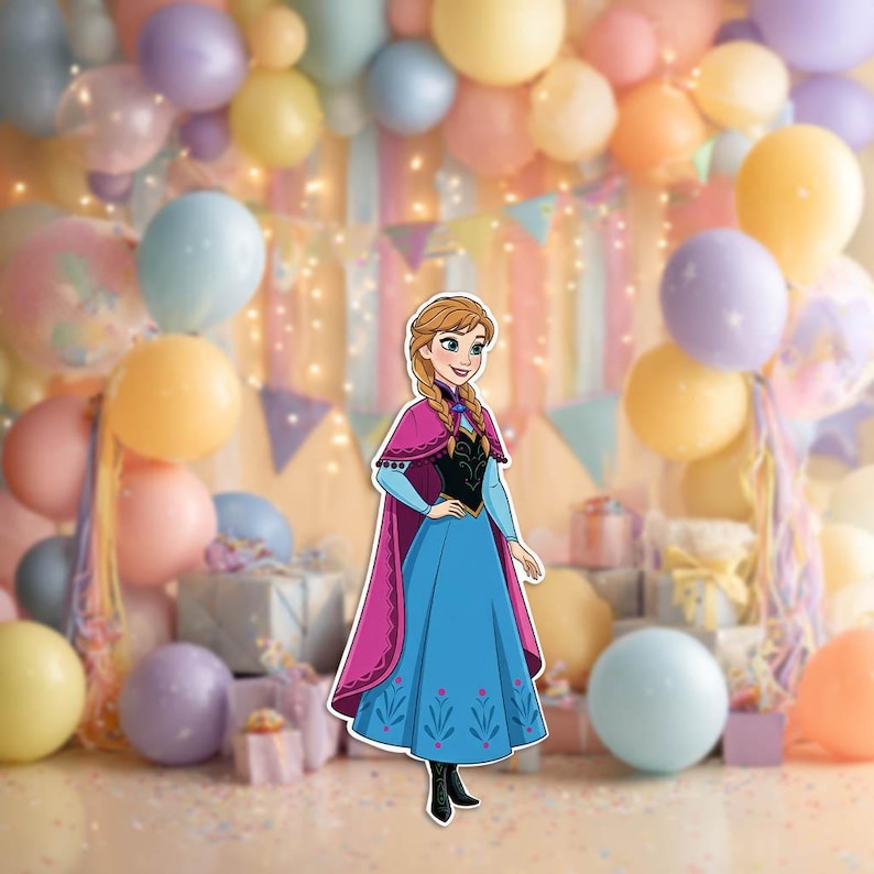 May include: A cutout of a cartoon character in a blue dress with a pink cape, standing in front of a backdrop of colorful balloons and gift boxes. The character has blonde braids and a smiling expression, suitable for a birthday party.