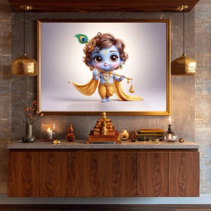 May include: A framed artwork depicts a cartoon-style figure of Krishna, adorned with a peacock feather and playing a flute. The artwork is set above a wooden cabinet with decorative items, including candles and a golden pyramid.