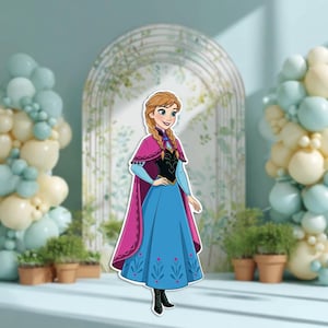 May include: A cutout of a cartoon character, Anna from Frozen, wearing a blue dress with a floral design, a black bodice, and a pink cape. Her hair is braided, and she is smiling. The background includes balloons and potted plants.