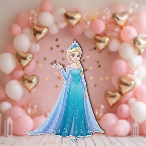 May include: A cutout of a cartoon character in a blue dress with a long cape and a crown. The character is in front of a backdrop of pink and white balloons, and gold heart-shaped balloons.