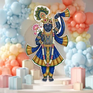 以下が含まれることがあります： 青と金の衣装を着た神の精巧なイラスト。蓮の花とスカーフを持っています。この人物は宝石と羽飾りで飾られています。背景にはパステルカラーの風船とギフトボックスがあります。