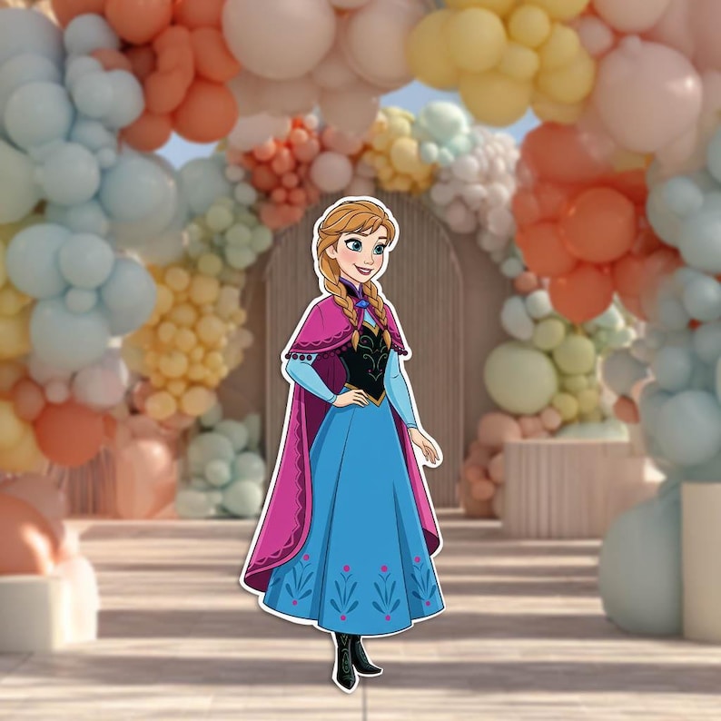 May include: A cutout of a cartoon character, wearing a blue dress with a pink cape. The character has blonde braids and is standing in front of a balloon archway with pastel colors. The background includes a wooden structure.