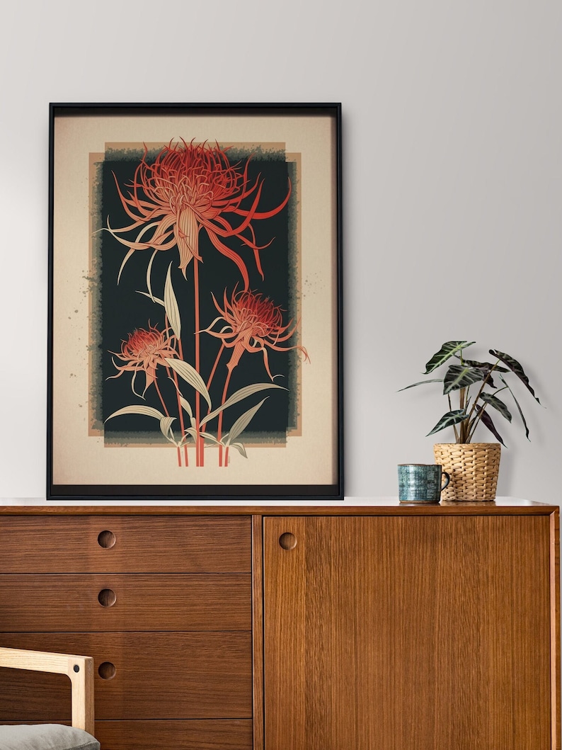 May include: A framed print of three red flowers with long, thin petals against a dark green background. The print has a vintage, distressed look.