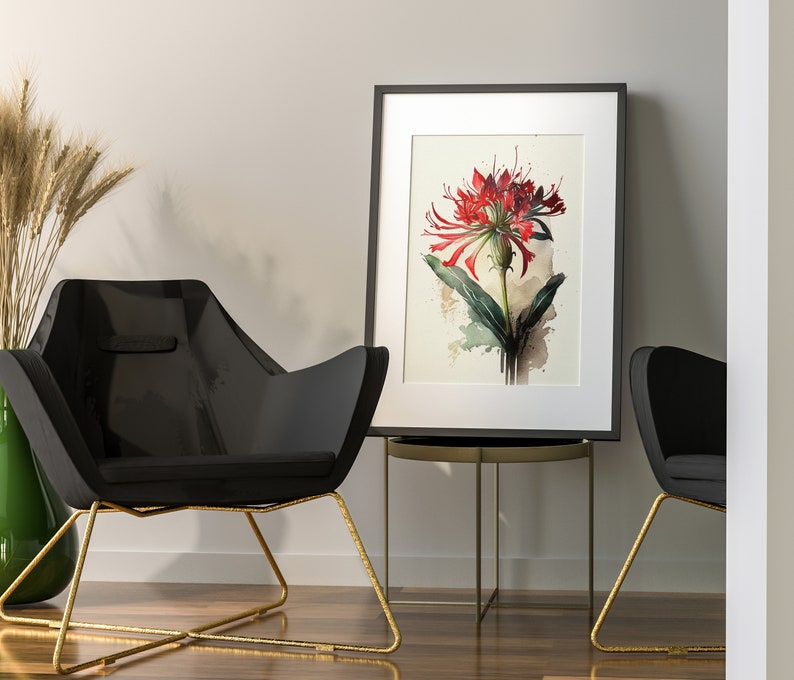 Puede incluir: Una pintura al agua enmarcada de una flor roja con hojas verdes sobre un fondo blanco. La pintura est&aacute; colgada en una pared blanca sobre una silla negra con patas doradas.