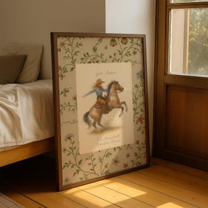 Puede incluir: Una impresi&oacute;n rectangular enmarcada con una ilustraci&oacute;n central de una persona con sombrero de vaquero montando un caballo marr&oacute;n encabritado. El texto 'yee haw' aparece arriba y 'E.L. Marshall, Palmetto, Florida' debajo.