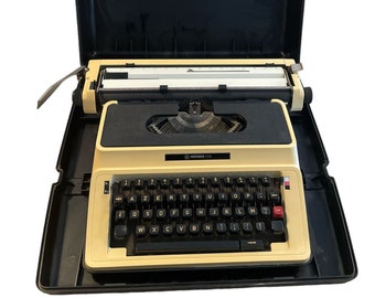 Hermès 405: Elegant Vintage Typewriter from the 1960s with its original case