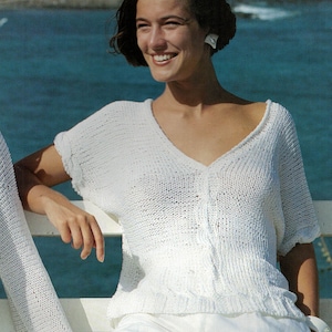 Pretty summer, cable detail top, knitted in one piece.  Knitting pattern download