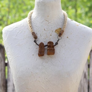 necklace with wooden figurines hand carved, a necklace with figurines of old peasant and old woman, tribal necklace with hemp rope, ooak